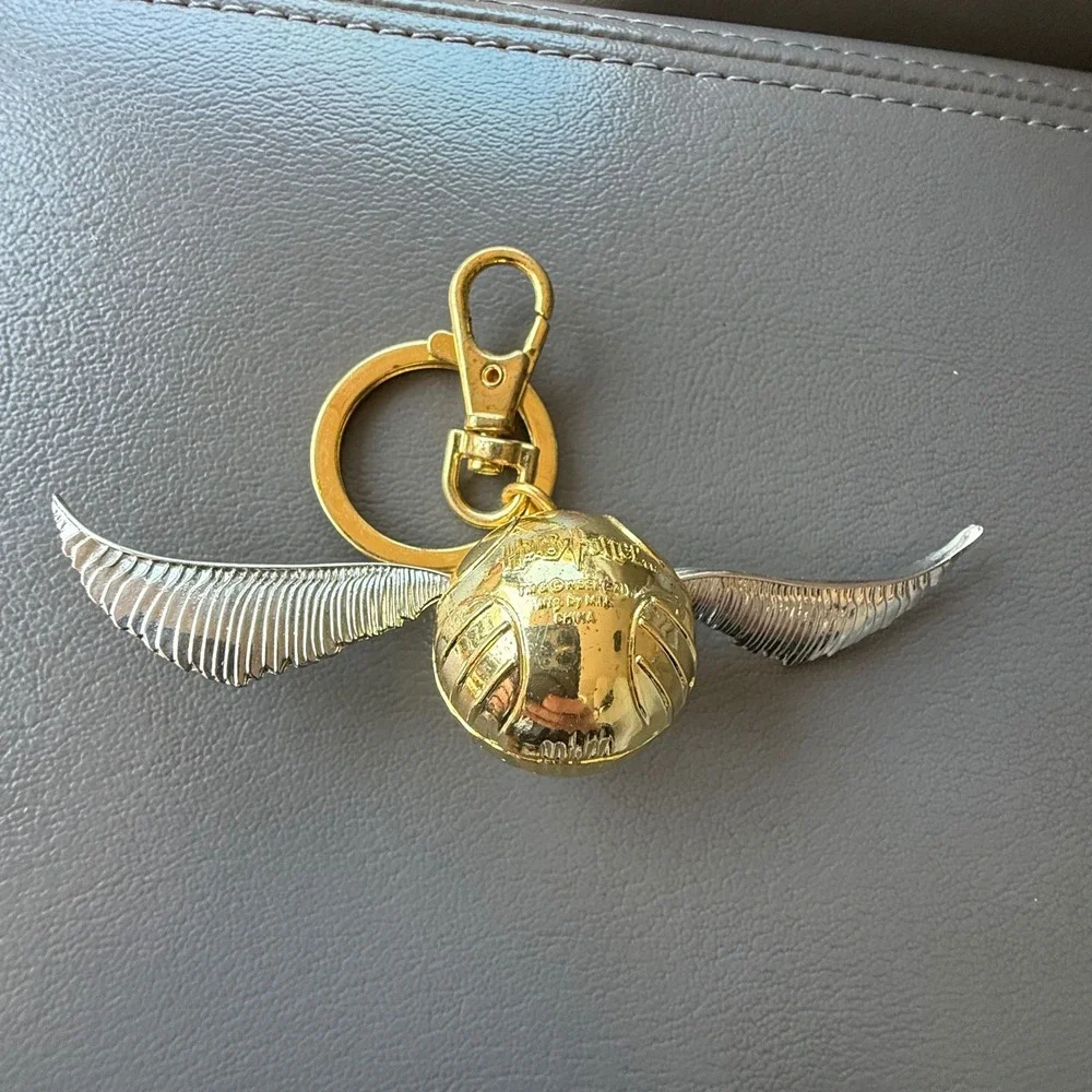 Harry Potter Golden Snitch Keychain Gold Silver Metal Quidditch Warner Bros 2021